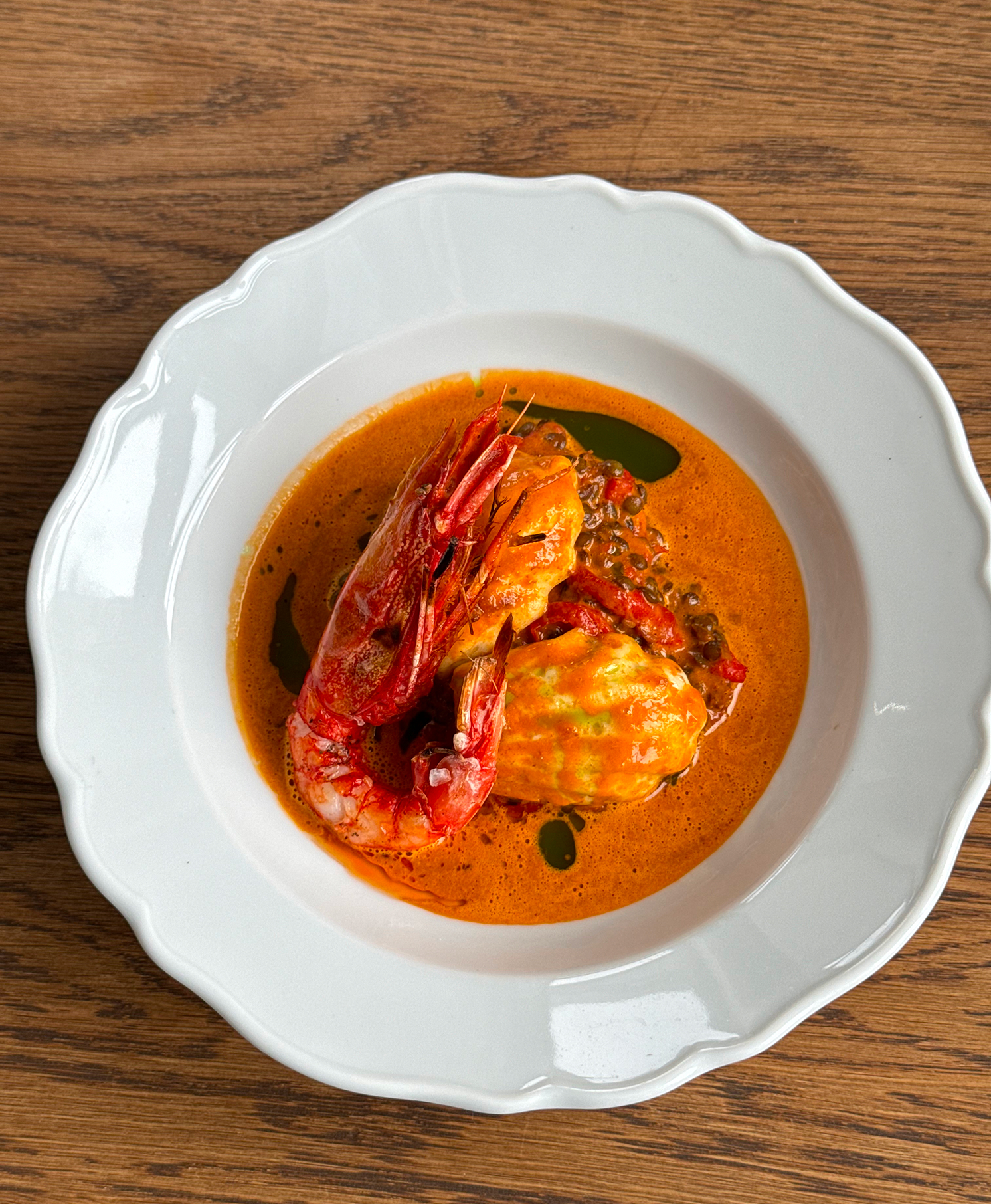 White plate with gambero rosso crab at restaurant elm