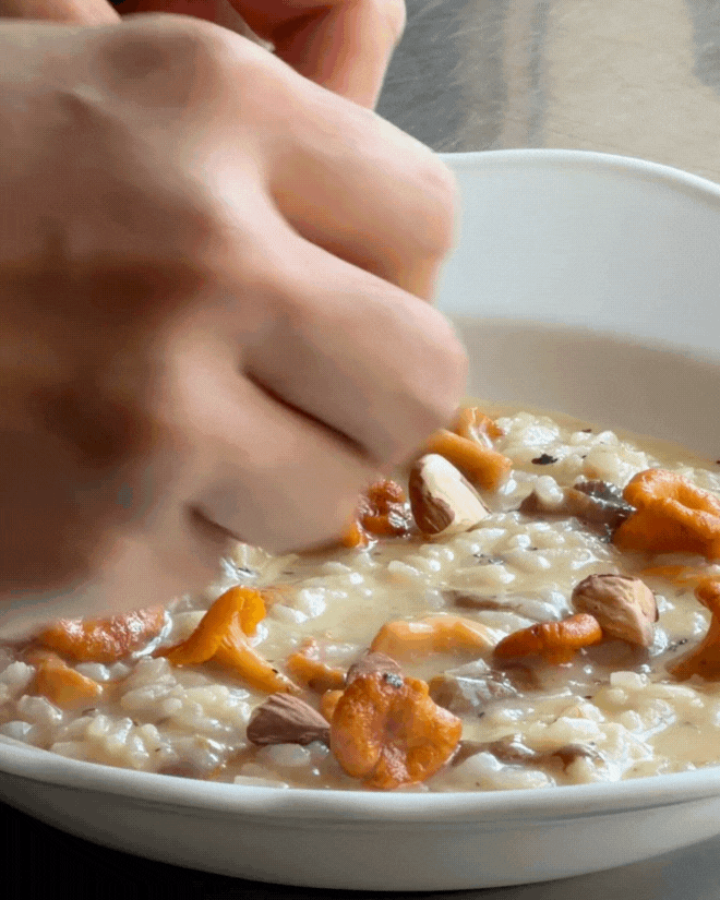 Mushroom risotto with romesco and almonds